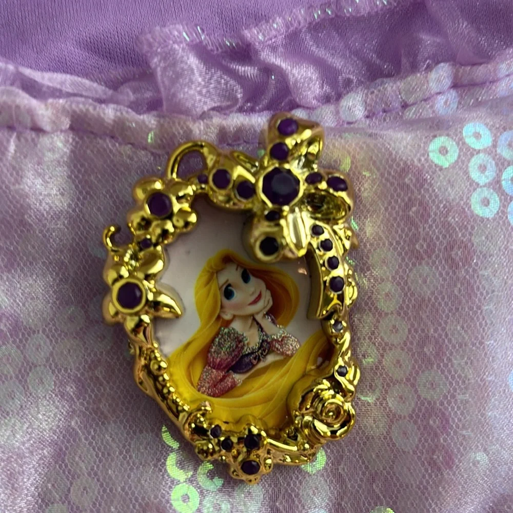 NWT Disney Princess Rapunzel Dress Up Dress. Girls Size M 7/8. Runs long. Pretty